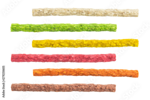 Фотография set of colorful dyed rawhide sticks for dog treat isolated on white background