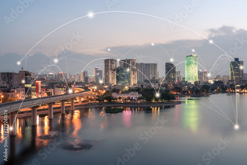 Smart city and wireless communication network concept. Digital network connection lines of Hanoi at Hoang Cau lake