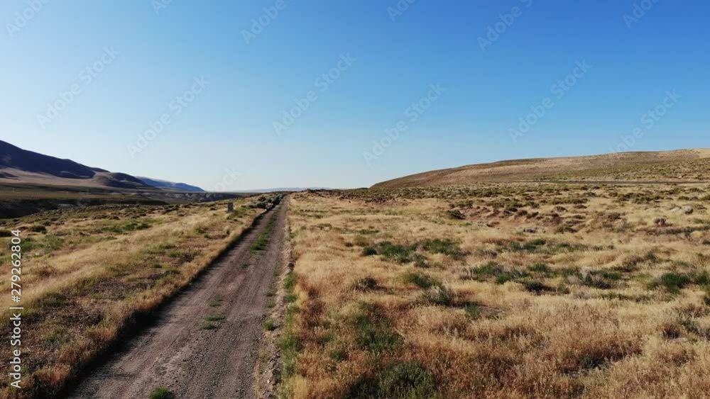 Flying Low over a Desert Dirt Road in Nevada - Aerial Drone. Flying Low over a Desert Dirt Road in Nevada - Aerial Drone.