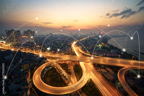 Smart city and wireless communication network concept. Digital network connection lines of Hanoi city at Vinh Tuy bridge