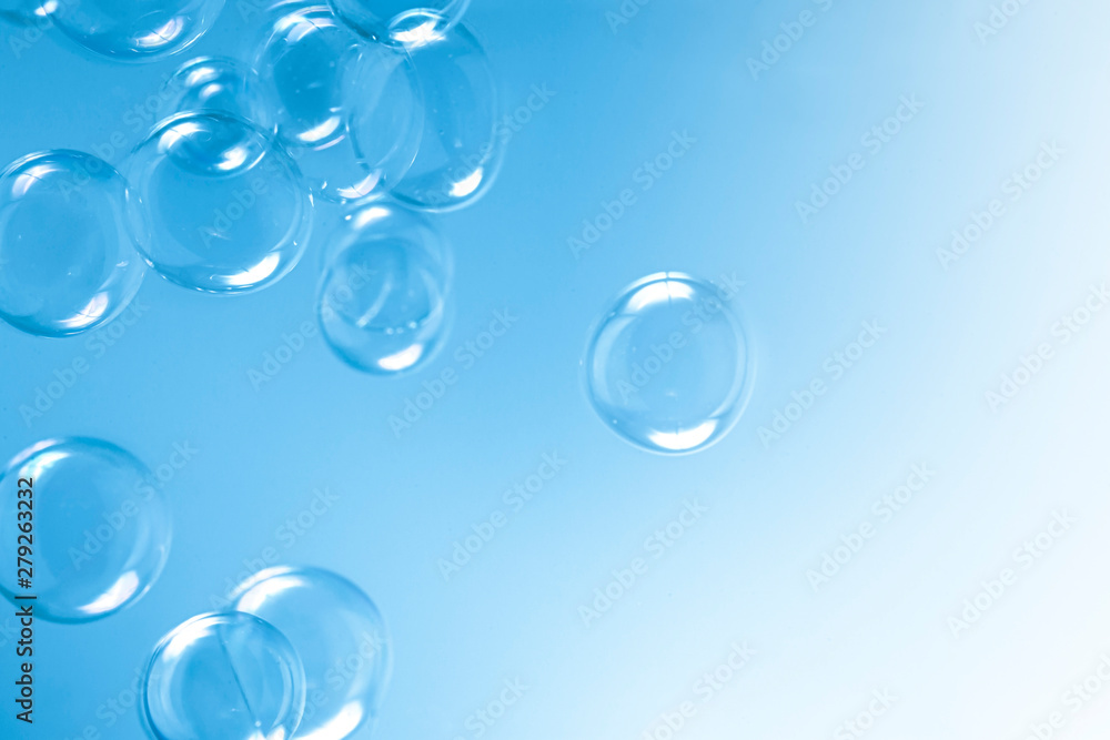 blue bubbles floating in the air. bubbles abstract background