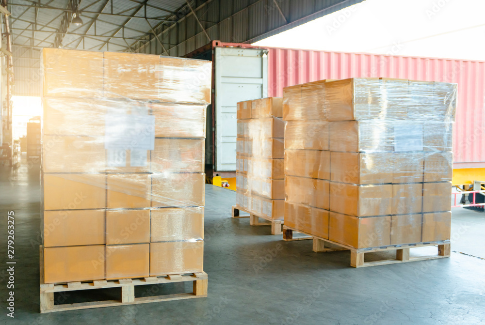 Packaging Boxes Wrapped Plastic Film on Pallet Loading into Shipping