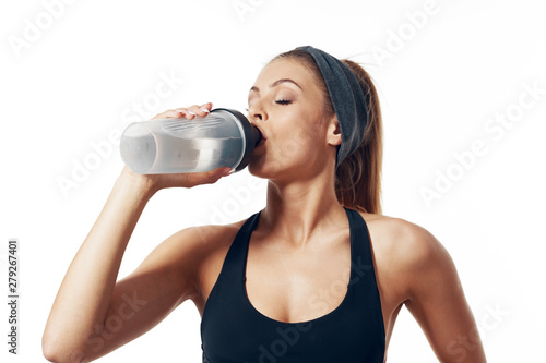 young woman with bottle of water