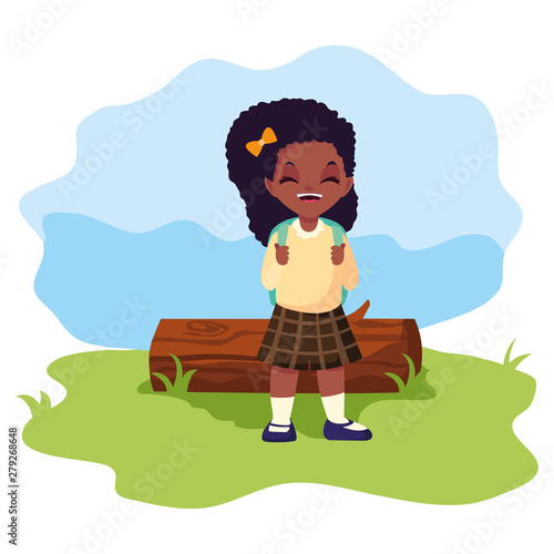 school girl with bag in the outdoors