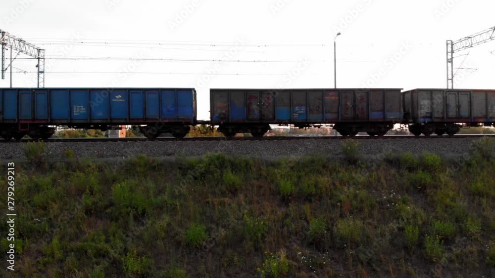 Train With empty Cargo Containers Moving Down Tracks Train With empty Cargo Containers Moving Down Tracks