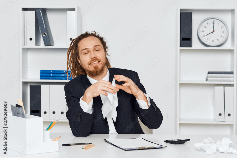 young businessman talking on the phone in office