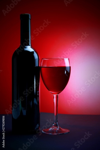 Glass Of Wine And Wine Bottle Without Label