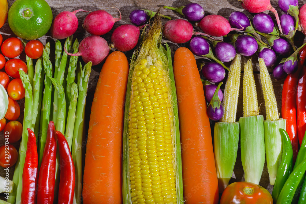 Backgroud of fresh food tasty and healthy varis vegetables are on the wooden table