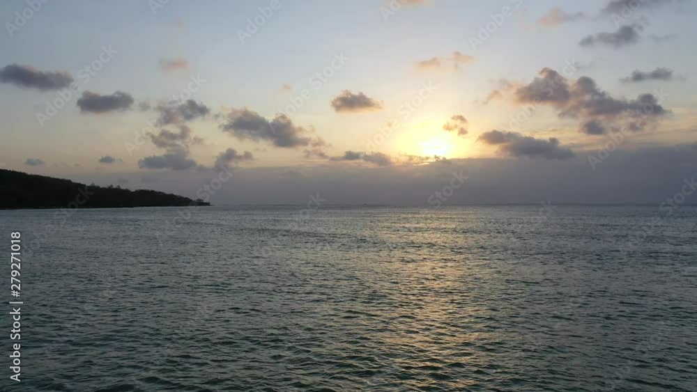 Aerial video on Jimbaran beach, Bali island. Drone flies in the evening. Aerial video on Jimbaran beach, Bali island. Drone flies in the evening.