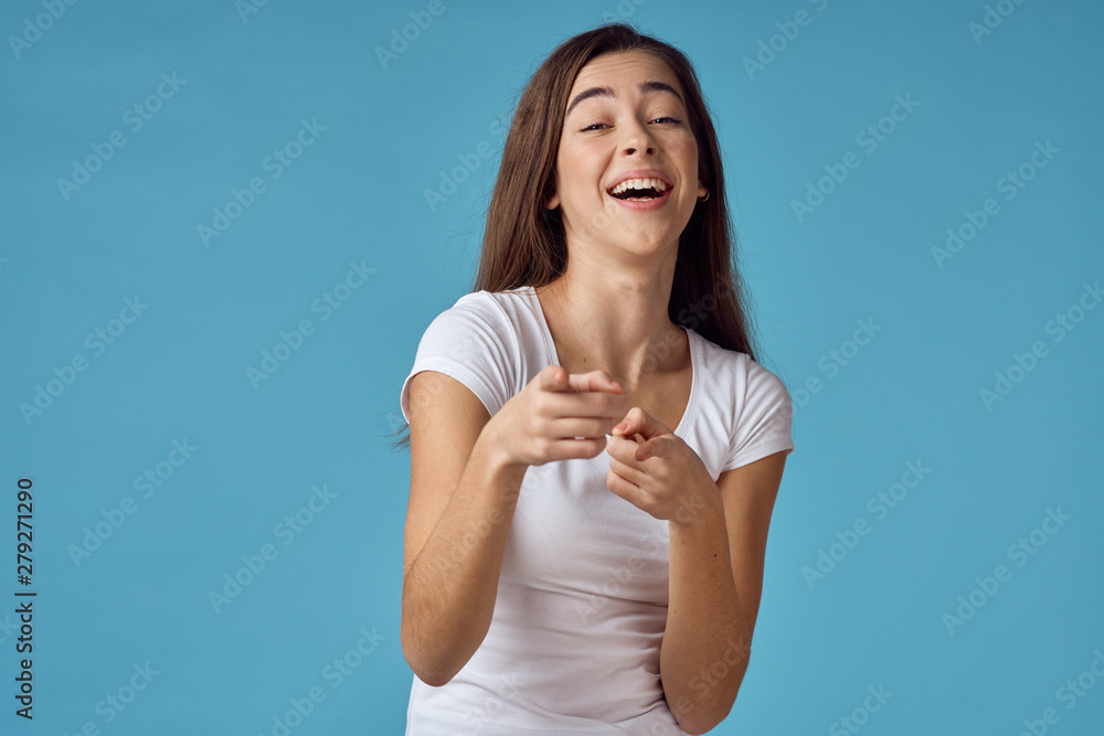 portrait of a young woman with thumbs up portrait of a young woman with thumbs up