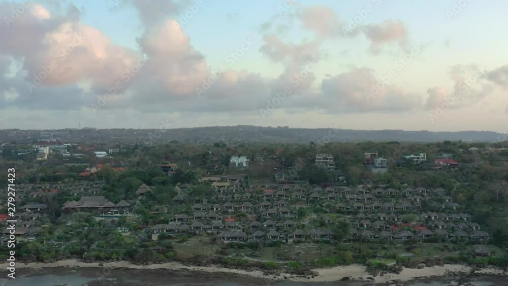Aerial video on Jimbaran beach, Bali island. Drone flies in the evening. Aerial video on Jimbaran beach, Bali island. Drone flies in the evening.