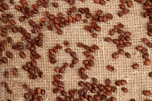 Coffee Beans Scattered Over Burlap