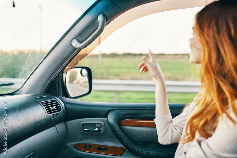 young woman driving a car young woman driving a car