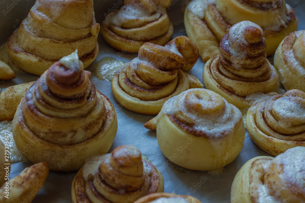 cinnamon buns in the form of spirals from the oven cinnamon buns in the form of spirals from the oven