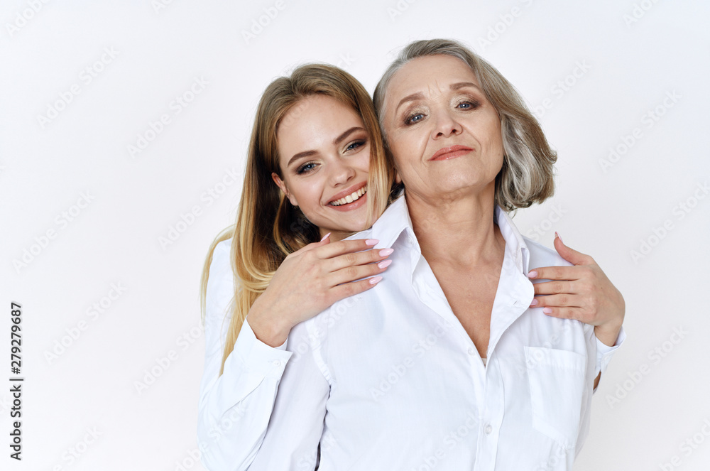 portrait of mother and daughter isolated on white portrait of mother and daughter isolated on white