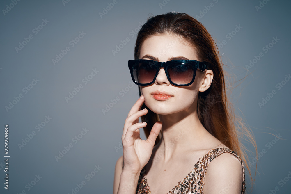 portrait of young woman in sunglasses portrait of young woman in sunglasses