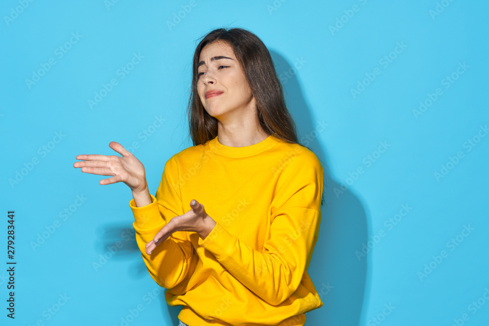 portrait of young woman with orange portrait of young woman with orange