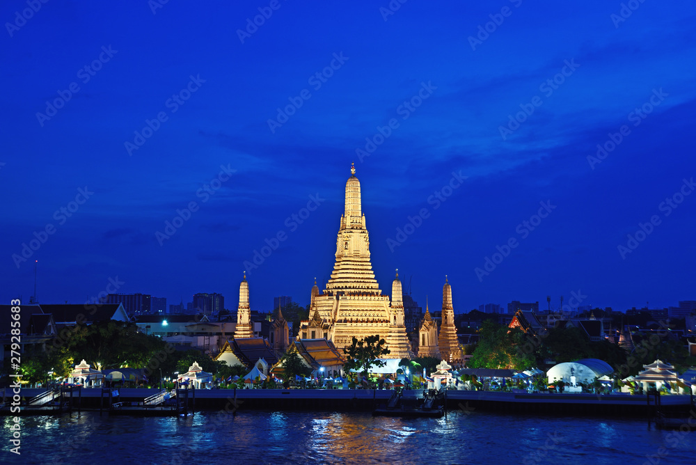 Bangkok city ,Thailand - April 15, 2019:Night time view of Wat Arun (Temple) across Chao Phraya River in Bangkok, Thailand  