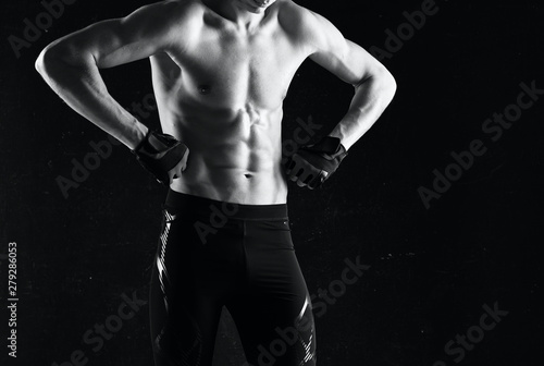 muscular man posing in studio