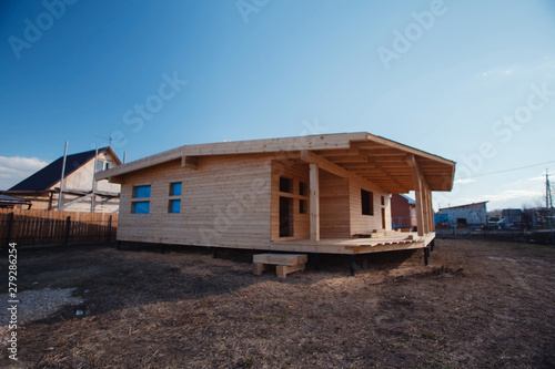 Modern eco-friendly materials. Timber house. The construction of ecological wood homes. Mortgage, loan, dream house. Country private house. interior. Layout of living rooms. © olga_polyanskaya