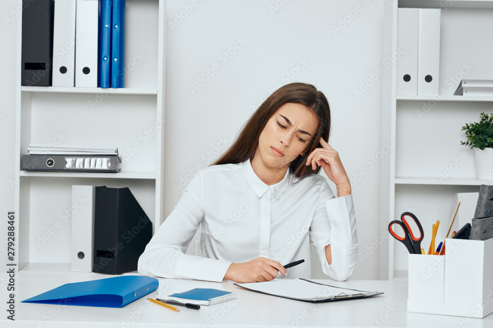 female doctor talking on the phone in office female doctor talking on the phone in office