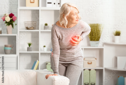 Mature woman suffering from...
