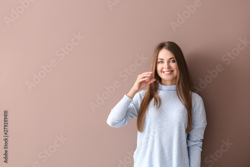 Young deaf mute woman using...