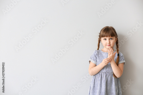 Cute deaf mute girl using s...
