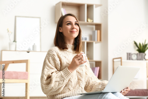 Beautiful young woman with ...