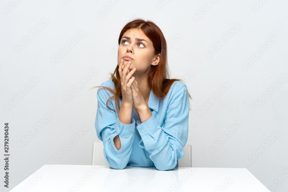 portrait of a young woman sitting on sofa portrait of a young woman sitting on sofa