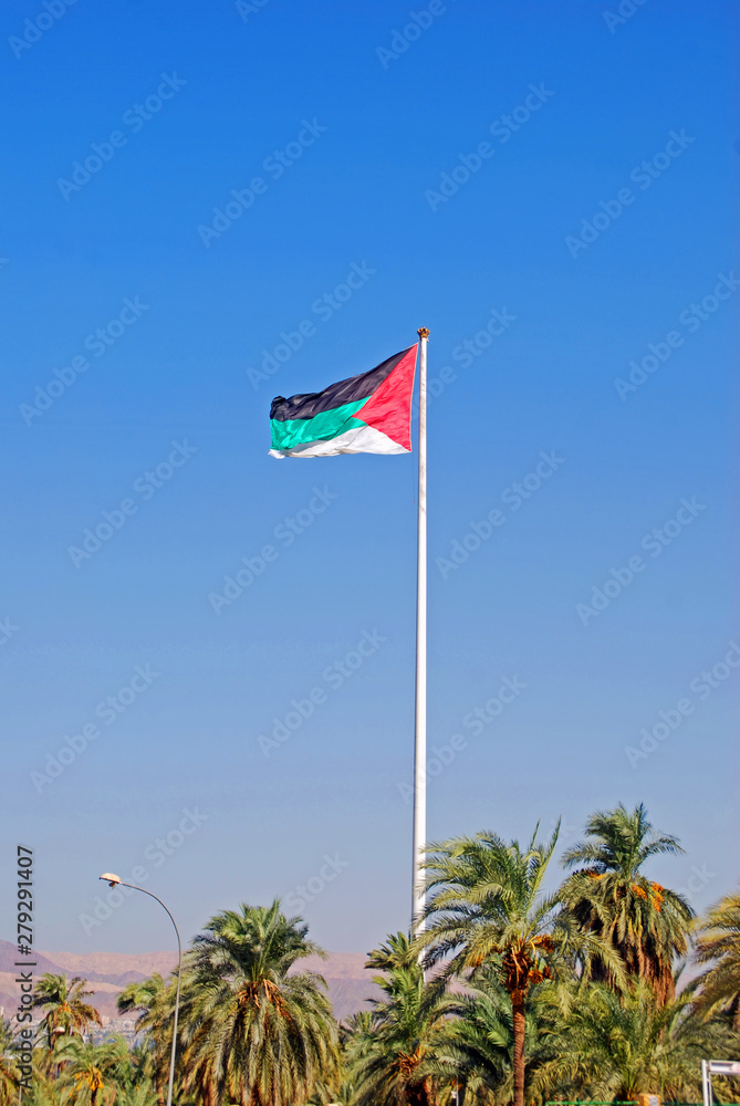 The giant flag of Jordan flying above the port of Aqaba