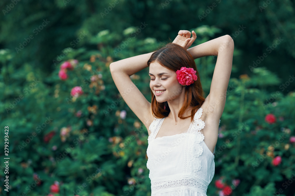 young beautiful woman with perfect skin in garden young beautiful woman with perfect skin in garden