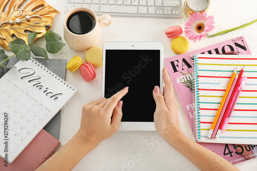 Woman with tablet computer ...