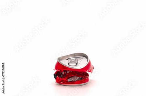 Compressed cans before discarding to help increase the area of waste disposal.