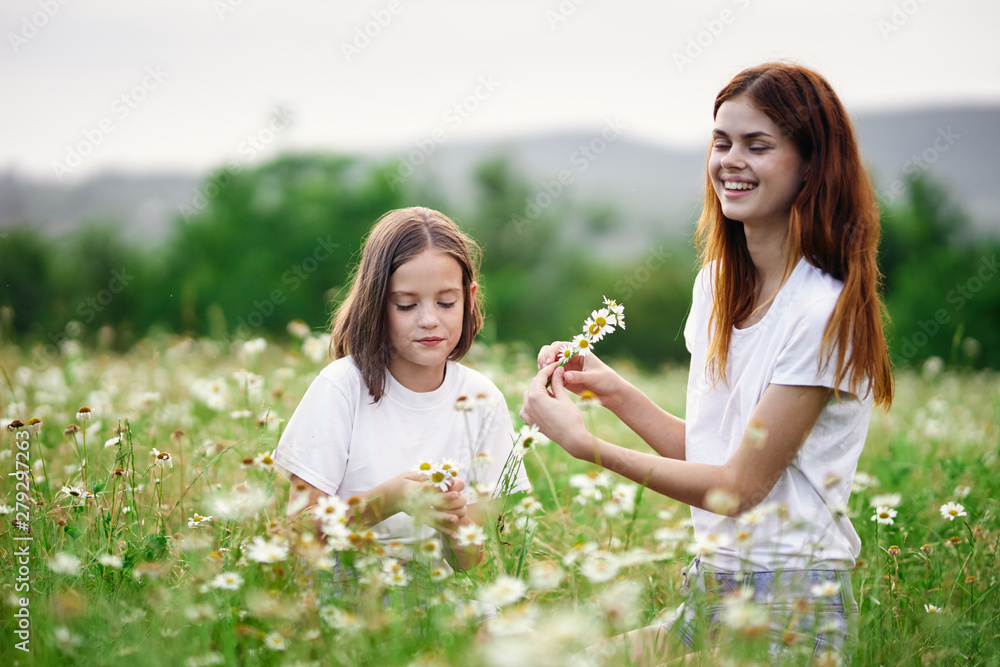 mother and daughter in the park mother and daughter in the park