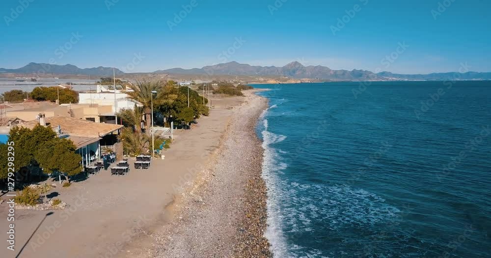Rocky beach and bars on the promenade aerial in Puntas de Calnegre in Murcia province of Spain Rocky beach and bars on the promenade aerial in Puntas de Calnegre in Murcia province of Spain