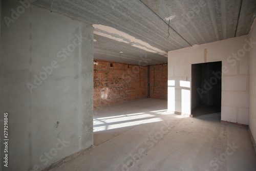 Empty large apartment after builders without repair. Start renovation. New house.