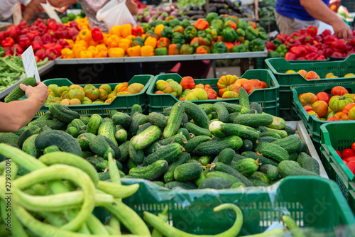 Sweet peppers, cucumbers, zucchini, tomatoes and other vegetables and fruits are sold at the seasonal farmers outdoor market in Spain