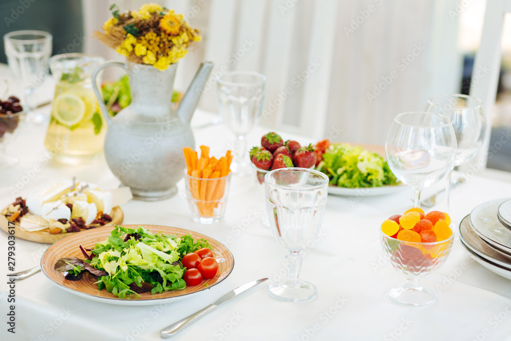Healthy appetizers and desserts serving on the veranda Healthy appetizers and desserts serving on the veranda