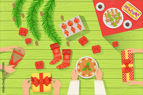 Family At The traditionally Served Christmas Table View From Above