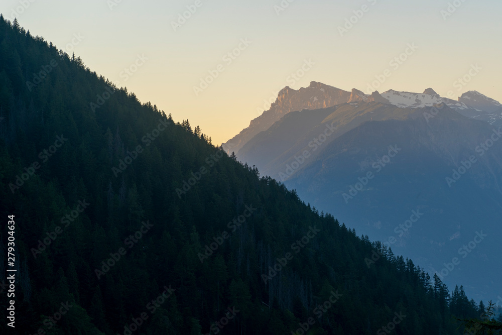 Mountains during early sunset in the Alps