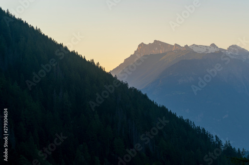 Mountains during early sunset in the Alps