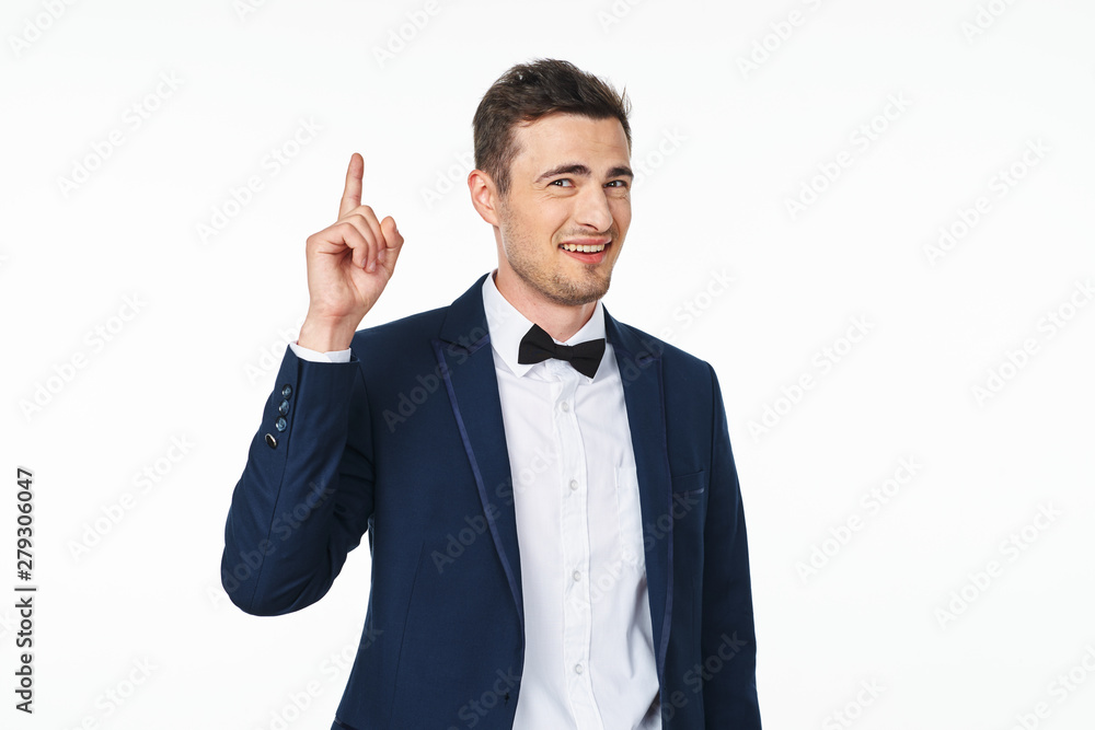 young businessman pointing up young businessman pointing up