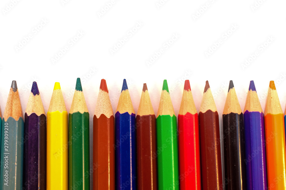 Color pencils in a row group isolated on white Color pencils in a row group isolated on white