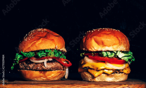 Two hamburger. Hamburger. Burger. Food. Table. Eating. 