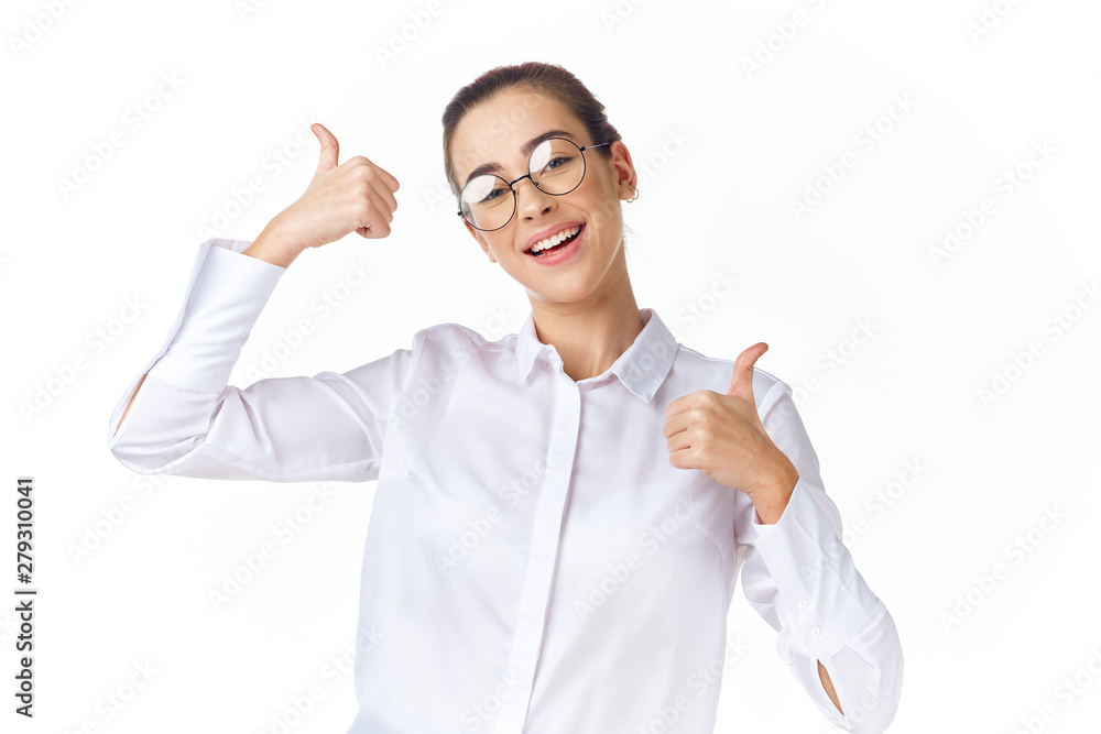 portrait of a young woman with thumb up portrait of a young woman with thumb up