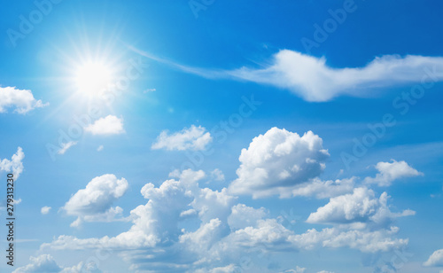 blue sky with white cloud and sun