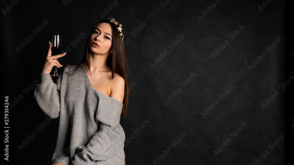 beautiful sexy girl, posing a short gray dress, black background chair beautiful sexy girl, posing a short gray dress, black background chair