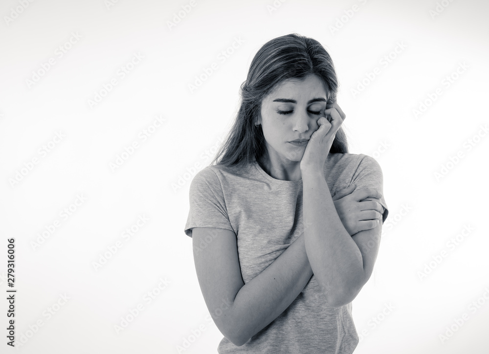 Portrait of sad and intimidated woman. Isolated in white background. Human expressions and emotions Portrait of sad and intimidated woman. Isolated in white background. Human expressions and emotions