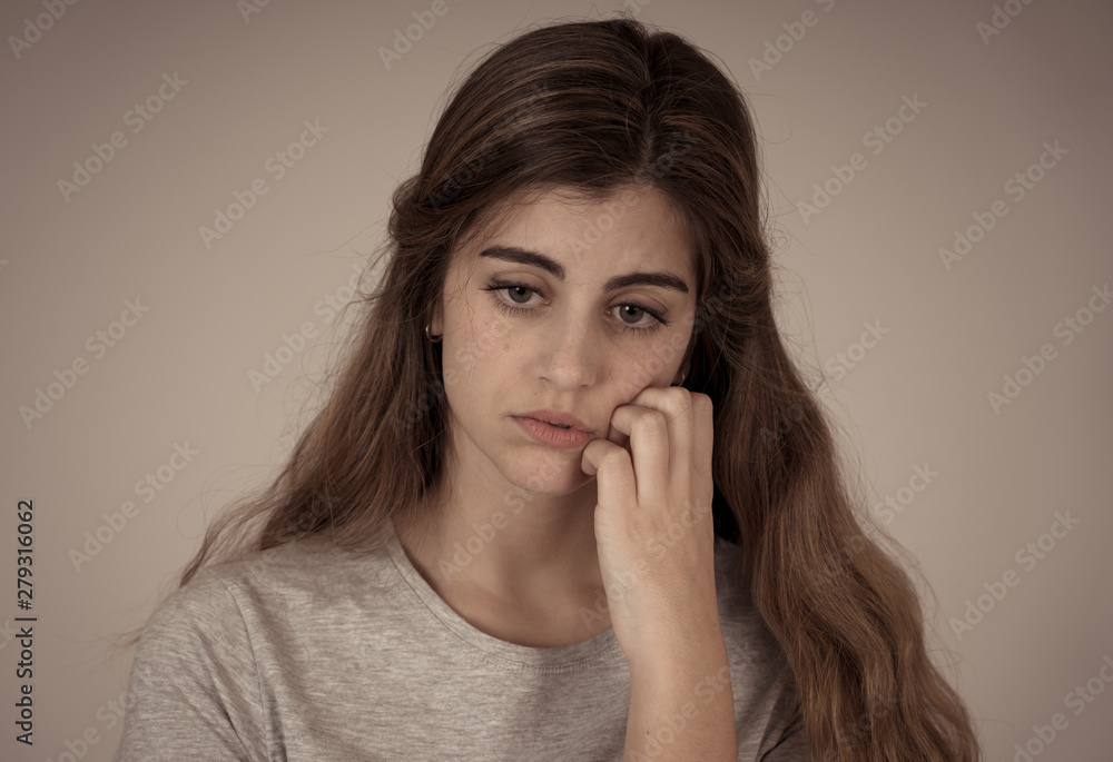 Portrait of sad and depressed woman. Isolated in white background. Human expressions and emotions Portrait of sad and depressed woman. Isolated in white background. Human expressions and emotions